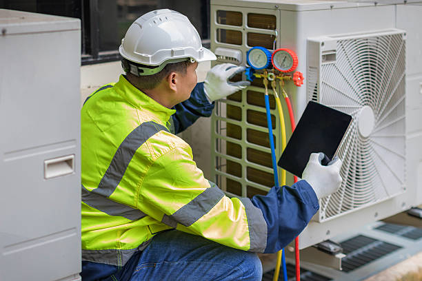 Professional Air Conditioning Repair technician working in Inglis, FL